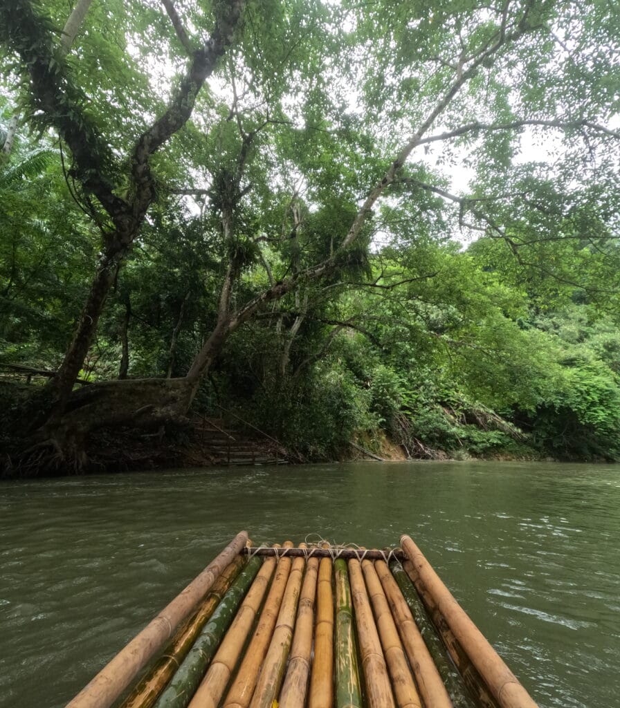 Khao Sok bamboo rafting experience on Sok River surrounded by limestone mountains and jungle